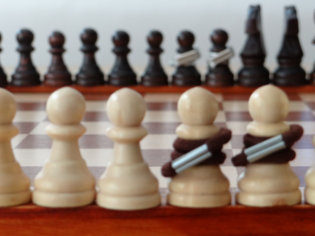Subedei pawns. They also capture backwards Mongol pawns and the Two Subedeis